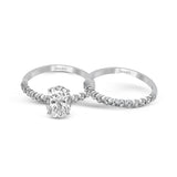 Oval-cut Engagement Ring & Matching Wedding Band in 18k Gold with Diamonds