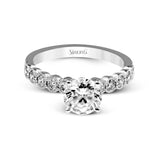 Round-cut Engagement Ring & Matching Wedding Band in 18k Gold with Diamonds