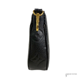 Black textured pouch with a gold zipper on a white background