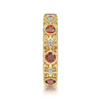 Gabriel & Co. filigree garnet ring on the hand
