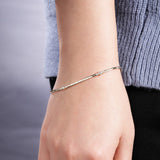 14K Yellow Gold Tennis Bracelet with Bezel Set Diamond Stations Gabriel & Co.