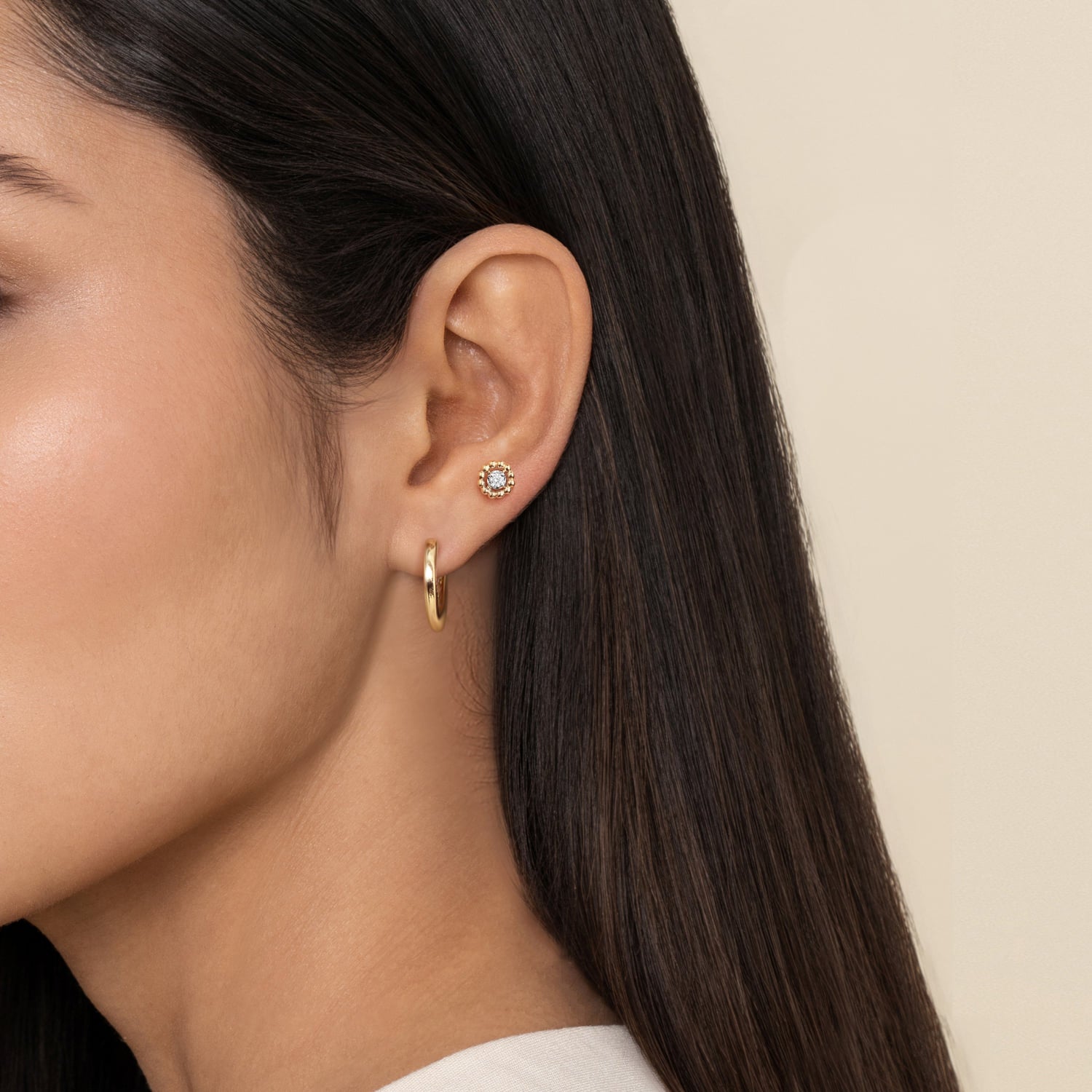 Gabriel & Co. Bujukan diamond flatback stud worn in the ear