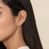 Gabriel & Co. Bujukan diamond flatback stud worn in the ear