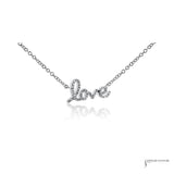 Diamond love script necklace in 14K white gold, close-up of pave diamonds