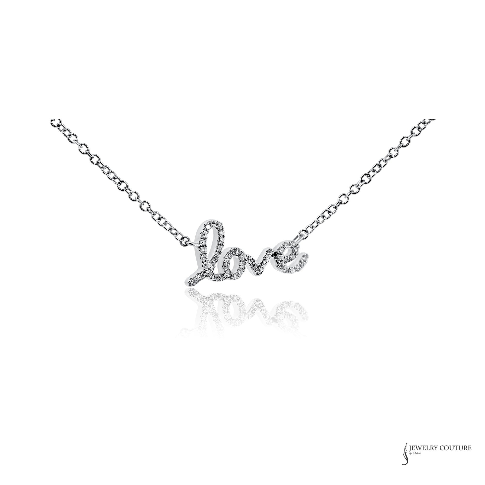 Diamond love script necklace in 14K white gold, close-up of pave diamonds