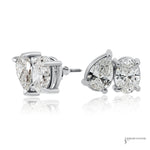 Pear and oval lab grown diamond stud earrings in 14K white gold, angled side view