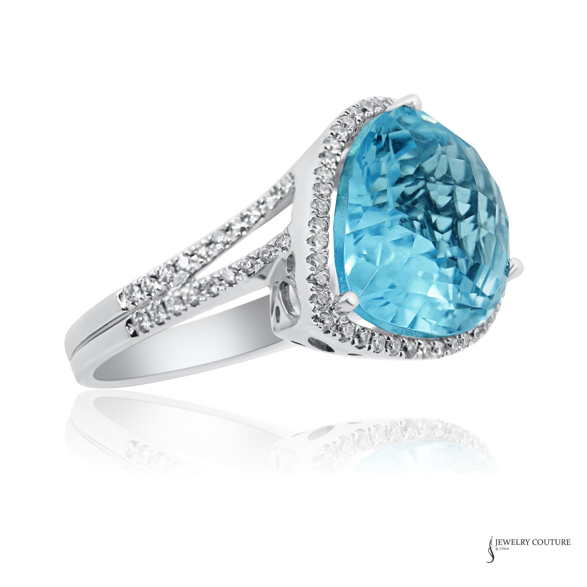 14K white gold pear blue topaz and diamond halo ring, side view of the diamond split shank