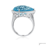 14K white gold pear blue topaz and diamond halo ring, profile view