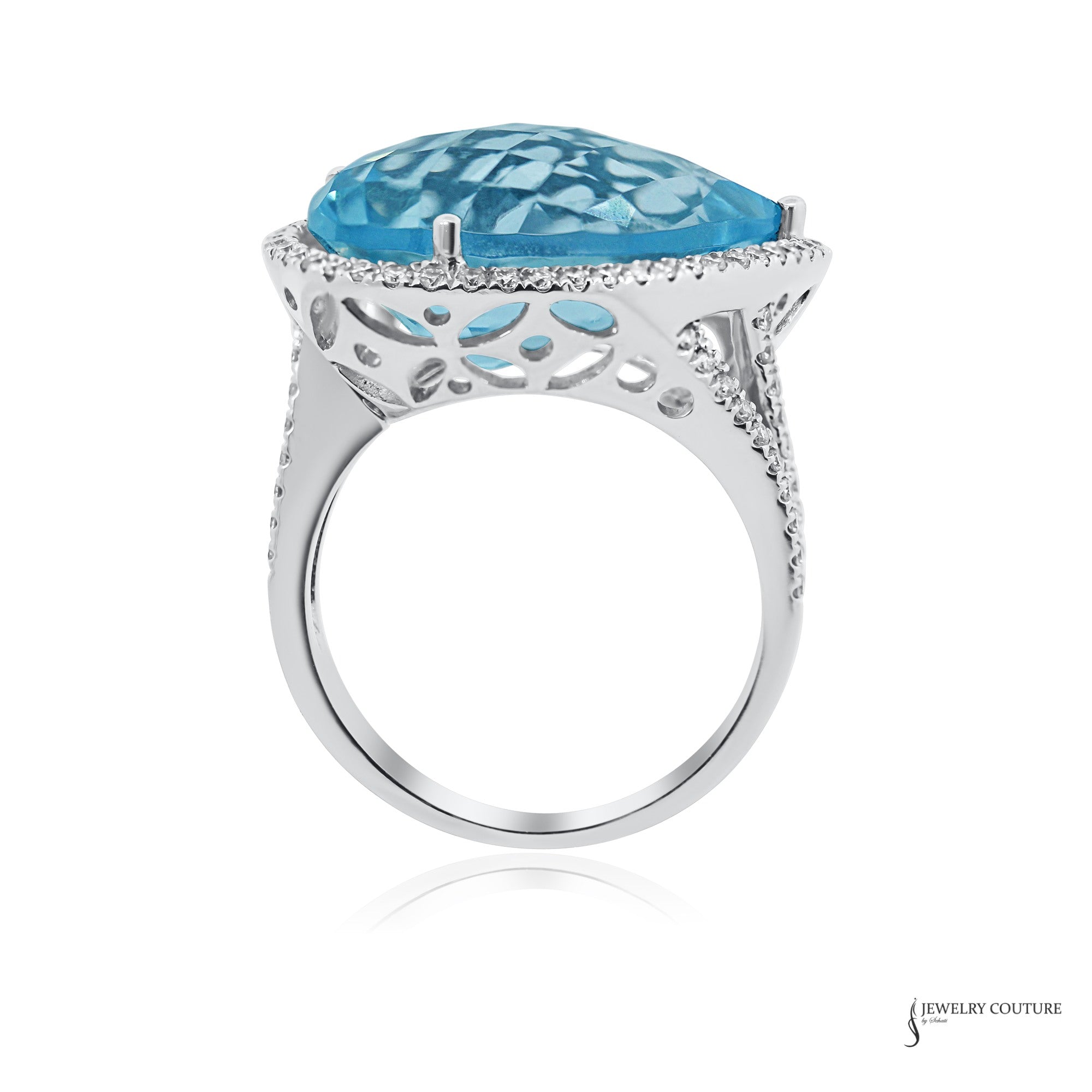 14K white gold pear blue topaz and diamond halo ring, profile view