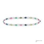 Multicolored gemstone bracelet on a white background with 'Jewelry Couture' branding.