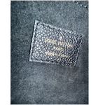 Louis Vuitton logo on a textured surface