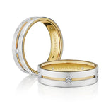 Two gold and silver rings with Verragio branding on a white background