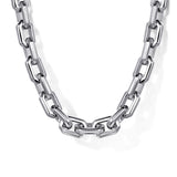 Silver chain necklace on a white background