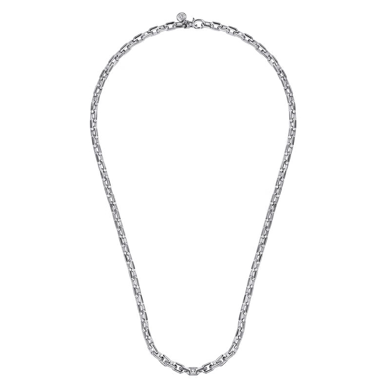 Silver chain necklace on a white background