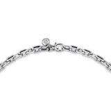 Silver bracelet with a clasp on a white background