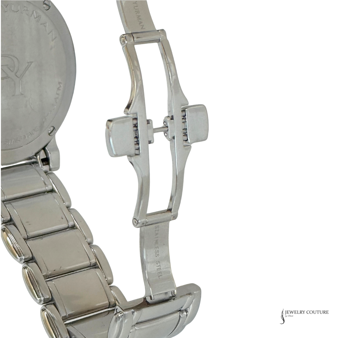 Close-up of a stainless steel watch band clasp and links, showing the metal construction and engraved details on a white background.