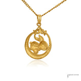 Back of 24K gold Year of the Rabbit moon pendant with 9999 purity stamp on the bail