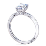 Diamond ring with a prominent gemstone on a white background