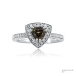 A triangular halo ring featuring a central brown alexandrite gemstone surrounded by a double halo of small clear stones, set on a silver-colored pavé band, shown on a white background with a reflection.