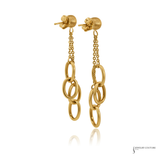 A pair of gold dangle earrings featuring a textured post, a short chain link, and three larger interlocking oval rings hanging below, shown on a white background with a faint reflection.