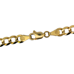 Close-up of a gold Cuban link chain bracelet showing the lobster clasp and engraved 14k purity stamp on a white background.