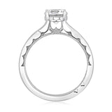Silver ring with a diamond on a white background