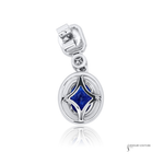 Silver pendant with a blue gemstone on a white background