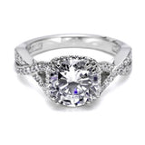 Diamond ring with intricate design on a white background