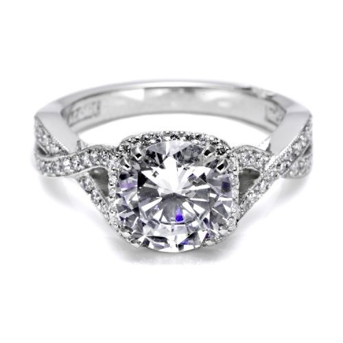Diamond ring with intricate design on a white background