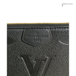 Close-up of a Louis Vuitton wallet with the brand logo.