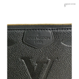 Close-up of a Louis Vuitton wallet with the brand logo.
