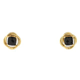 A pair of gold-toned twisted rope stud earrings with square-cut black gemstones, shown against a plain white background.