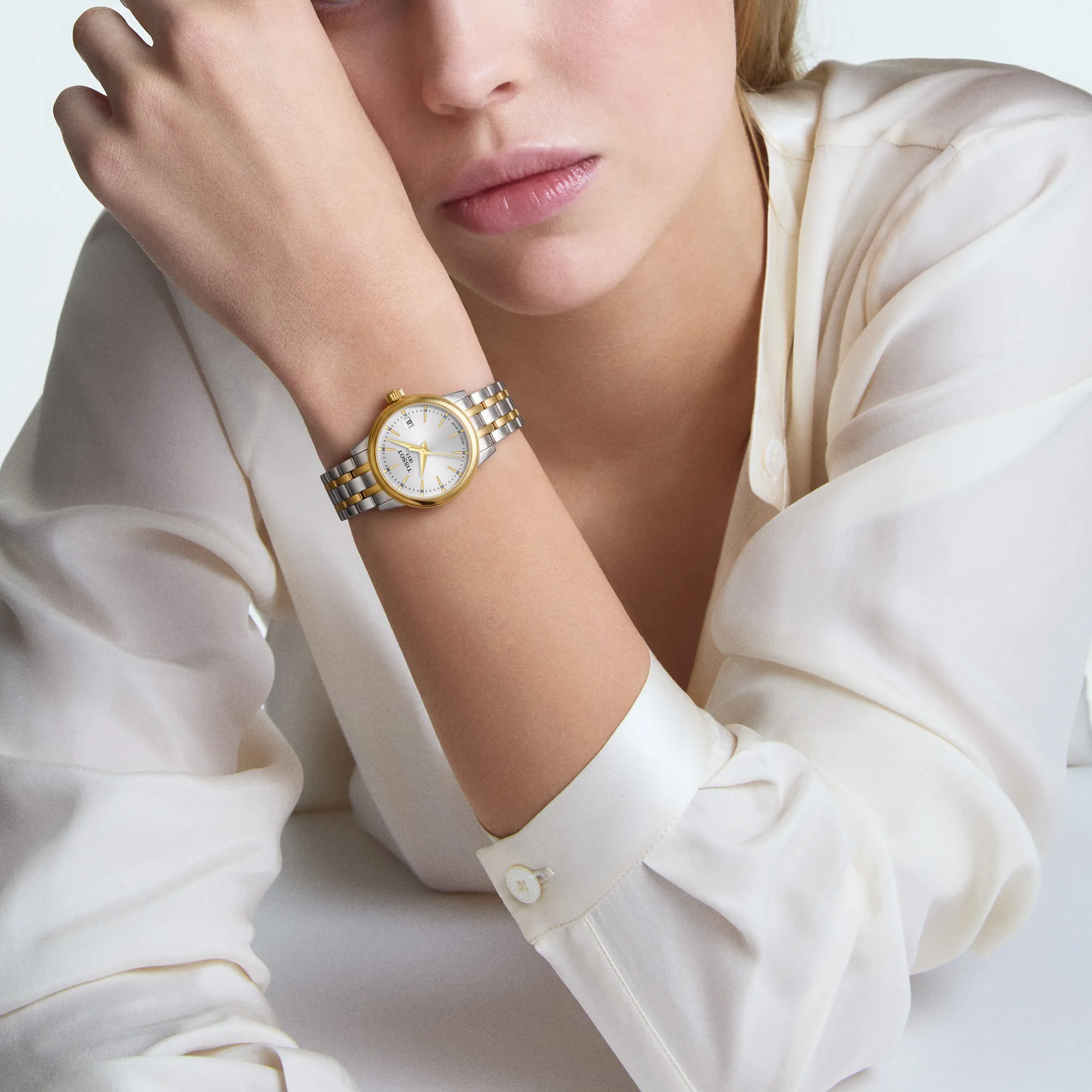 Tissot Classic Dream 28mm two-tone watch on the wrist