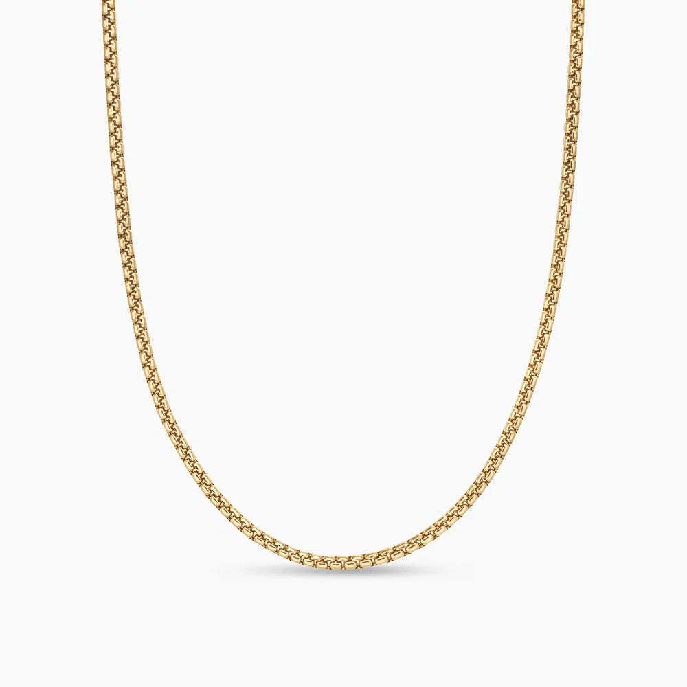 A gold-toned chain necklace with a textured, woven link design, shown against a plain white background.