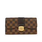 Designer wallet with checkered pattern on a white background