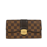 Designer wallet with checkered pattern on a white background