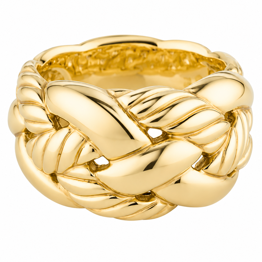A polished yellow gold ring with a thick, sculptural design featuring interlocking twisted and ribbed bands, photographed on a seamless white background.
