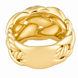 A polished yellow gold ring with a wide, sculptural band featuring a braided and layered textured design, shown on a plain white background.