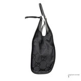 Black handbag with Gucci logo on a white background