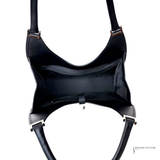 Black leather harness with gold hardware on a white background