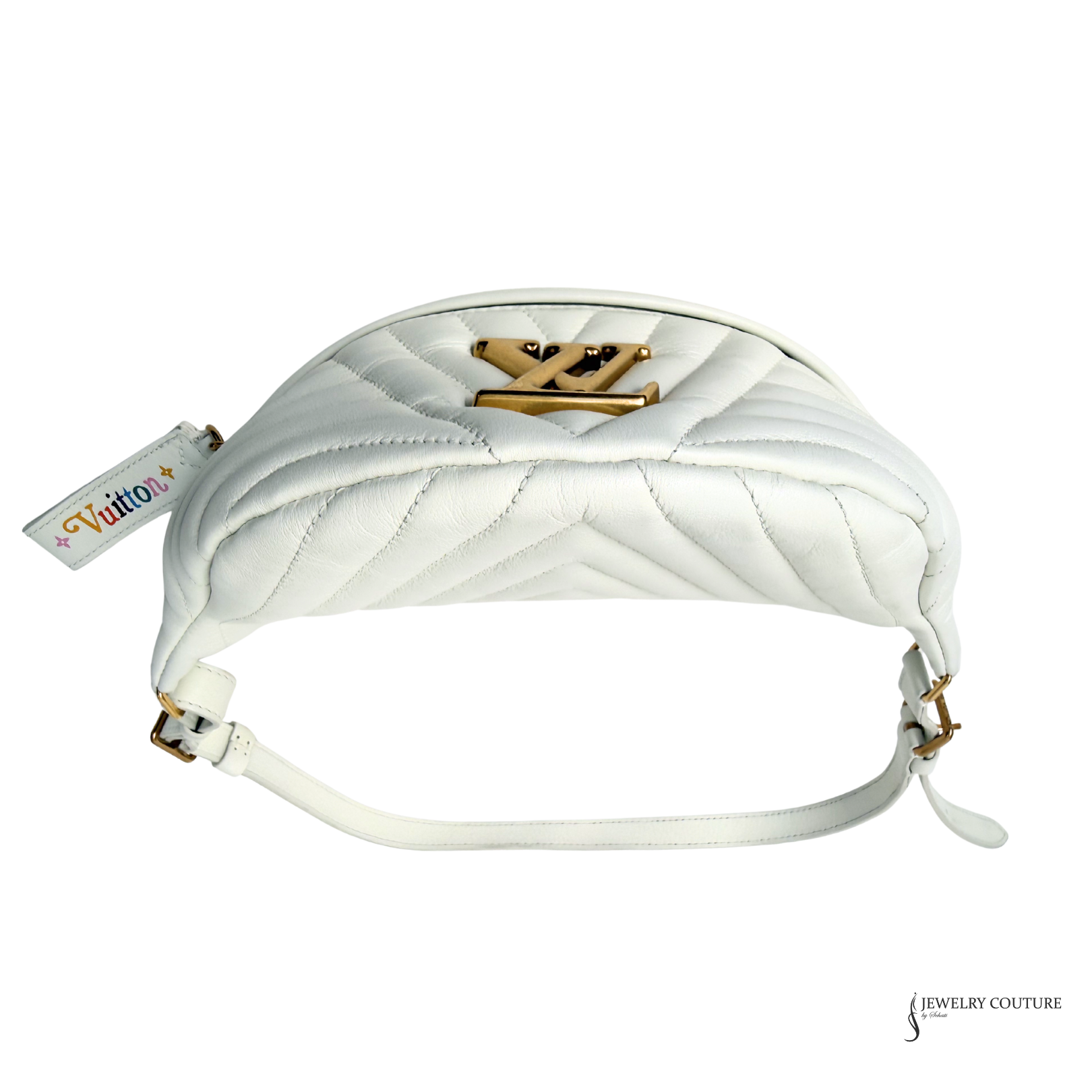 White quilted handbag with gold accents on a white background