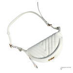 White handbag with a chevron pattern on a white background