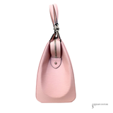 Pink handbag with a visible brand logo on a white background