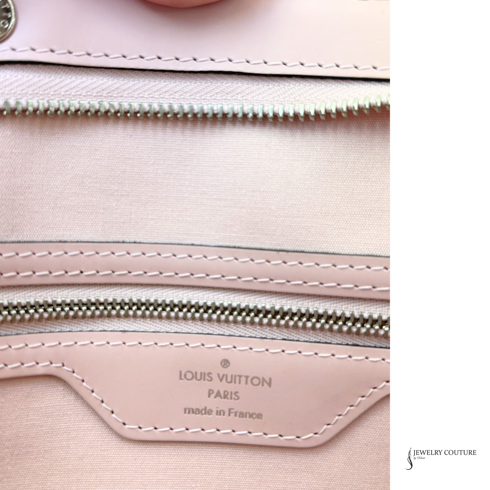 Close-up of a Louis Vuitton handbag with visible branding and stitching details.