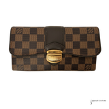 Designer wallet with checkered pattern and gold clasp on a white background