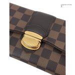 Close-up of a Louis Vuitton handbag with gold clasp on a white background