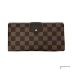 Checkered wallet with gold clasp on a white background