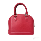 Red handbag on a white background
