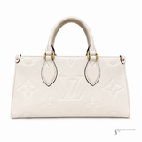 Louis Vuitton OnTheGo East West Monogram Empreinte Leather Shoulder Bag Cream | Authentic Pre-Owned LV Pre-Owned