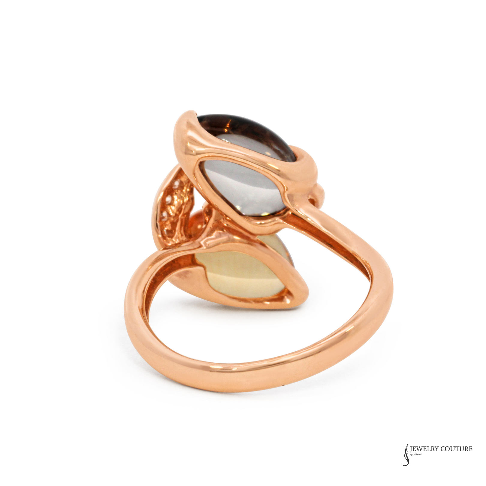 Rose gold ring with multicolored gemstones on a white background